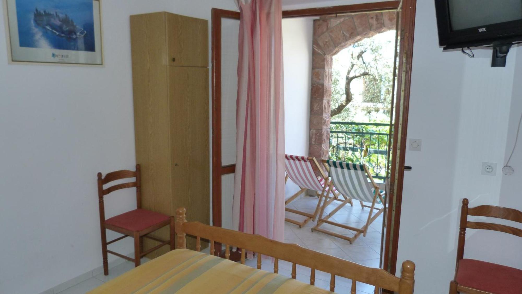 Zoro Apartments Ilha Sveti Stefan Quarto foto